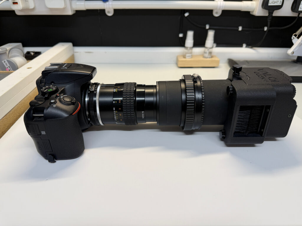 camera, lens and tubes with a box on the end