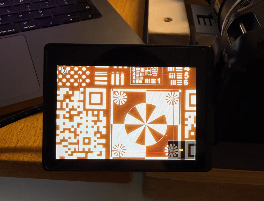 camera display showing geometric shapes and numerals