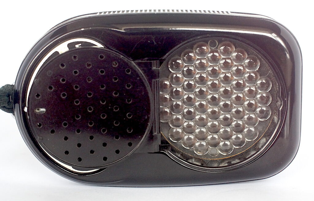 Weston meter with low level flap open. When closed only the light through the perforations reaches the sensor.