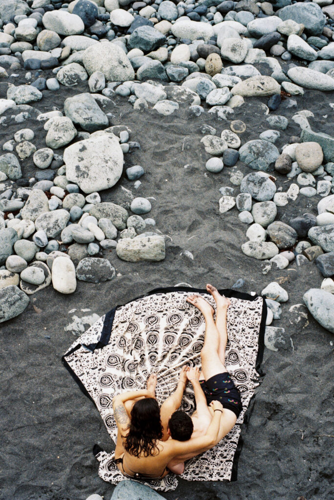 Couple chilling on the beach.