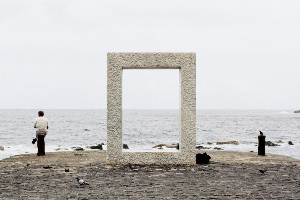 A man fishing by the sea.
