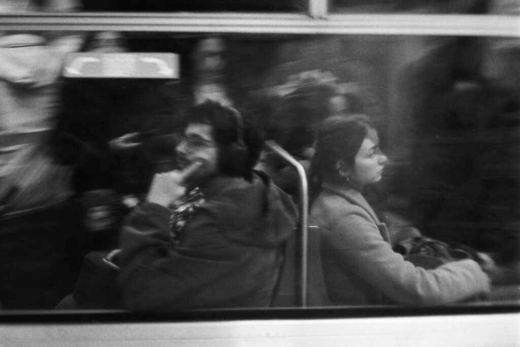 Image of people on a train.