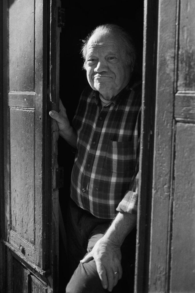 Street portrait of a man in B&W.