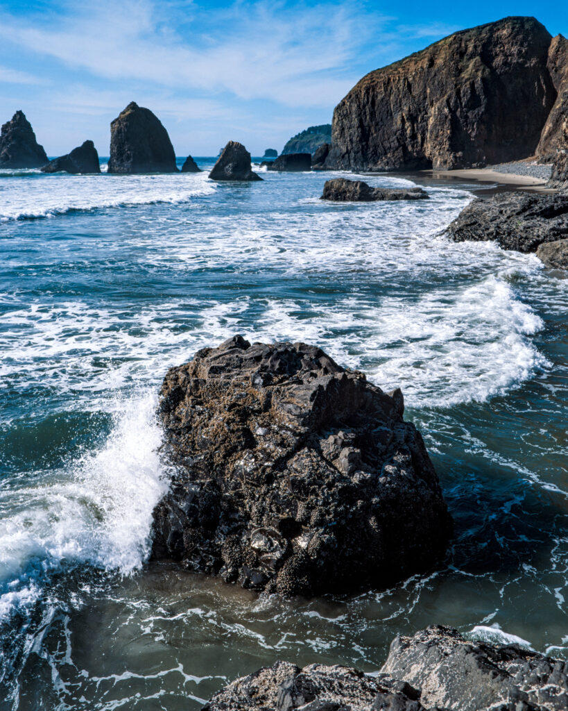Tunnel Beach Haystacks | Mamiya 7ii | 65mm f/4 | Ektachrome E100 + Tiffen 812 Filter