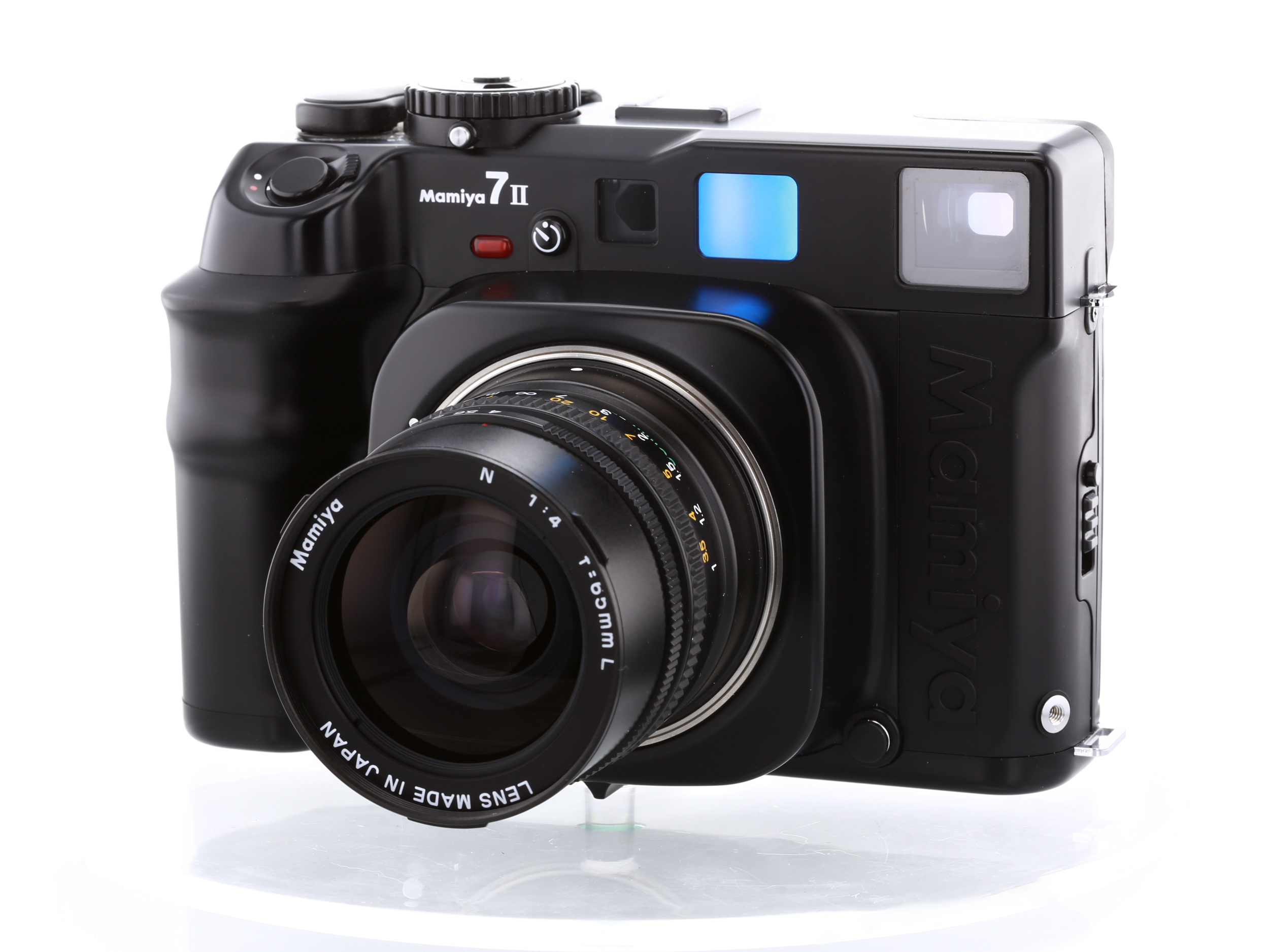 Mamiya 7ii with 65mm f/4 lens on white background © Sam Westenskow