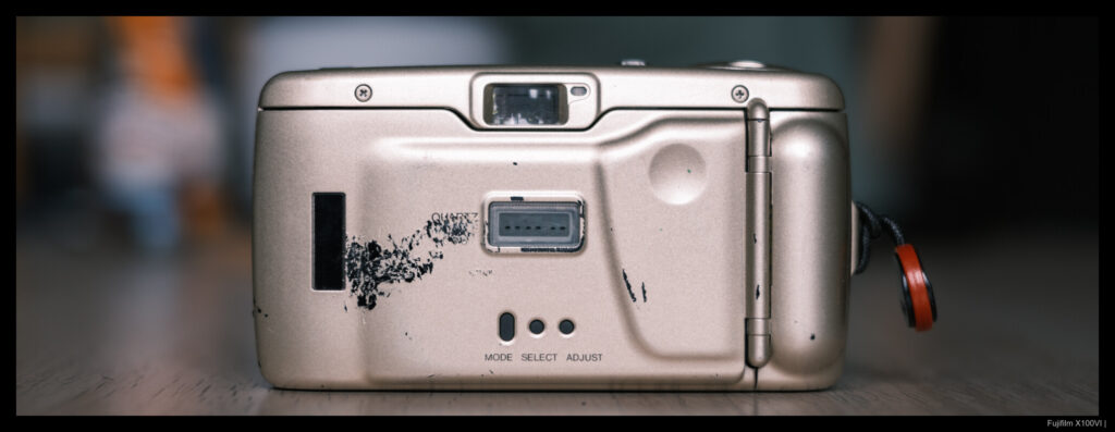 The back of the Minolta Ps, showing damage to its finish from abrasion