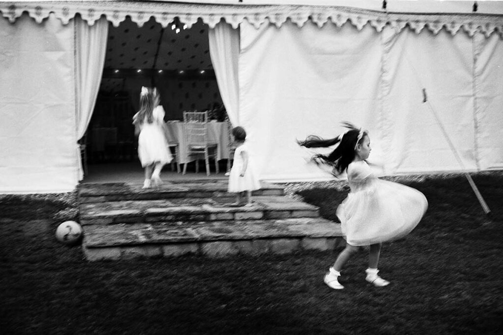 Flower girls at a wedding shot with a slow shutter speed using a Leica M4-P camera.