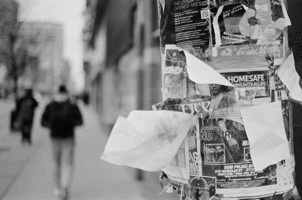 Pamphlets on a utilities pole