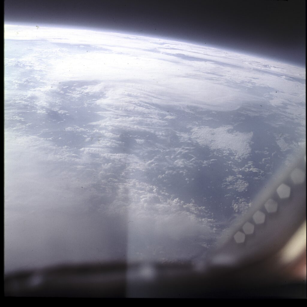 picture taken through a spacecraft's window from space of earth