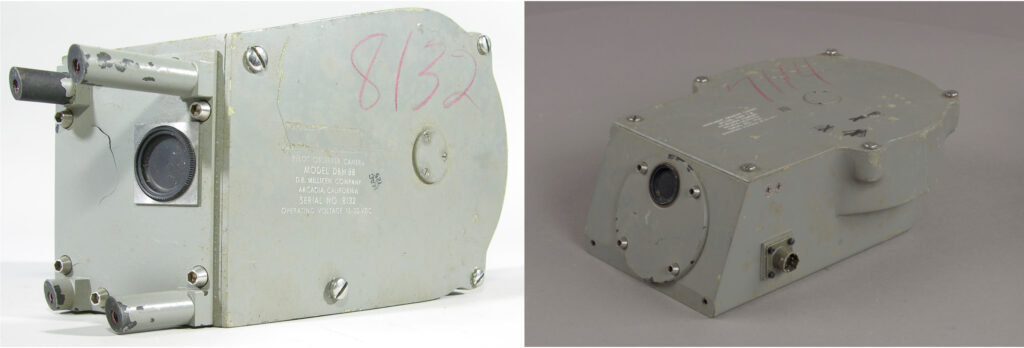 two metal boxes with glass lenses and fixings