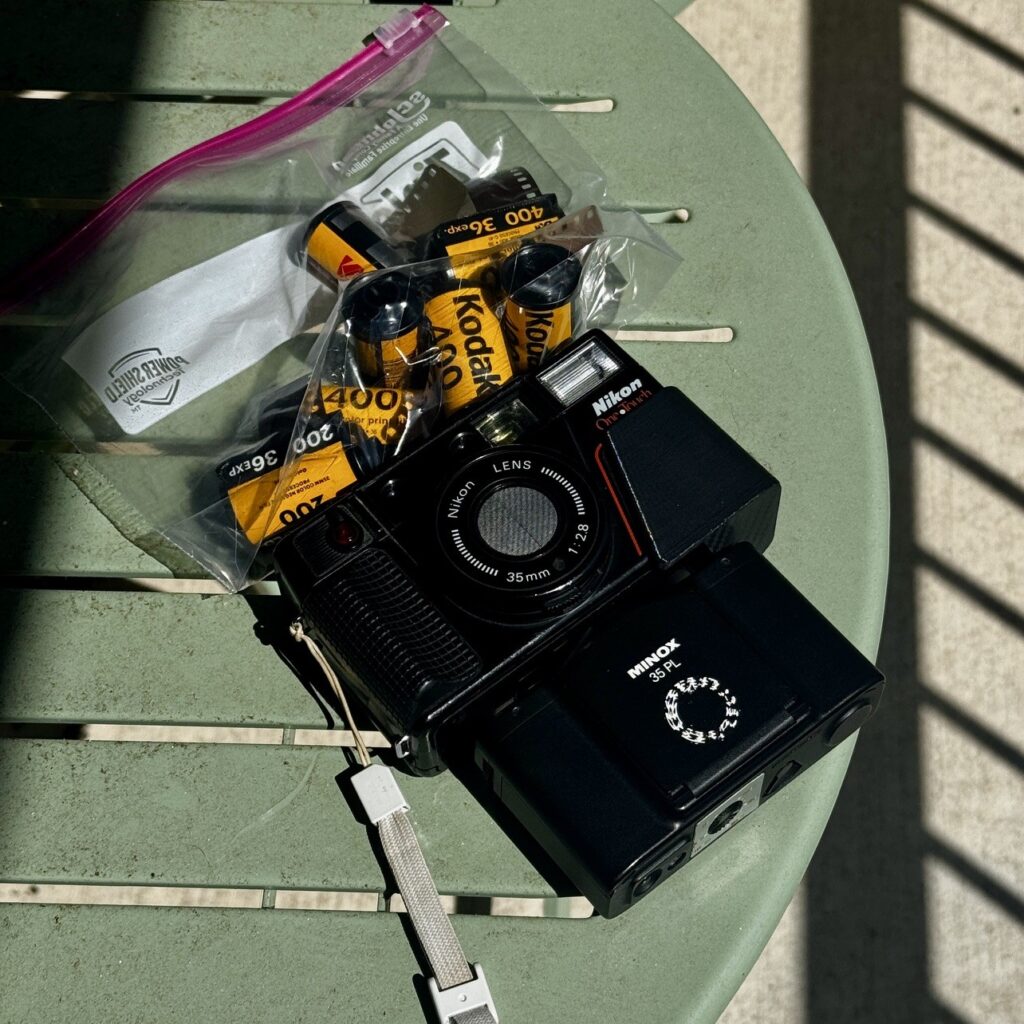 Minox next to Nikon