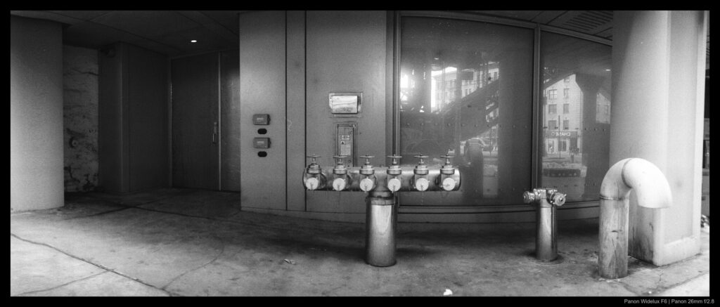 An image of a building side with slight distortion from the camera's lens movement.