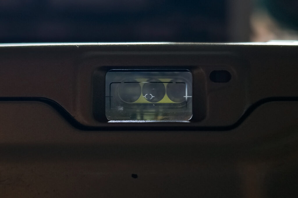 The view through the P's viewfinder, with the ready light visible to the right