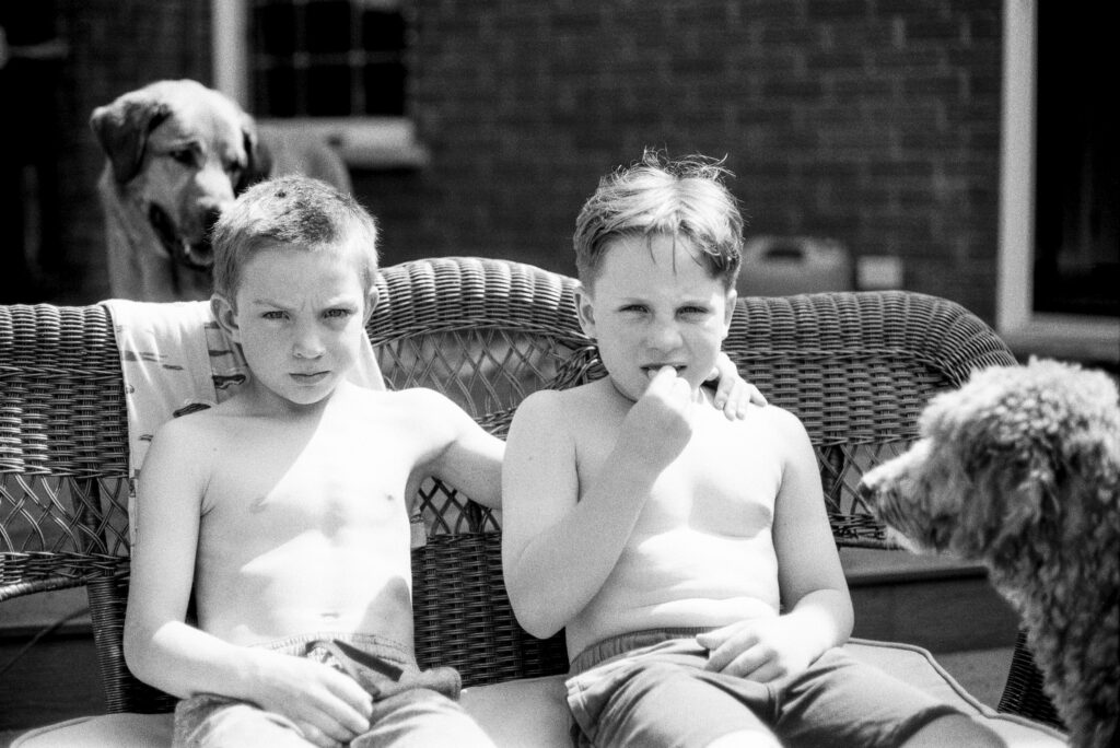 Two boys sitting together