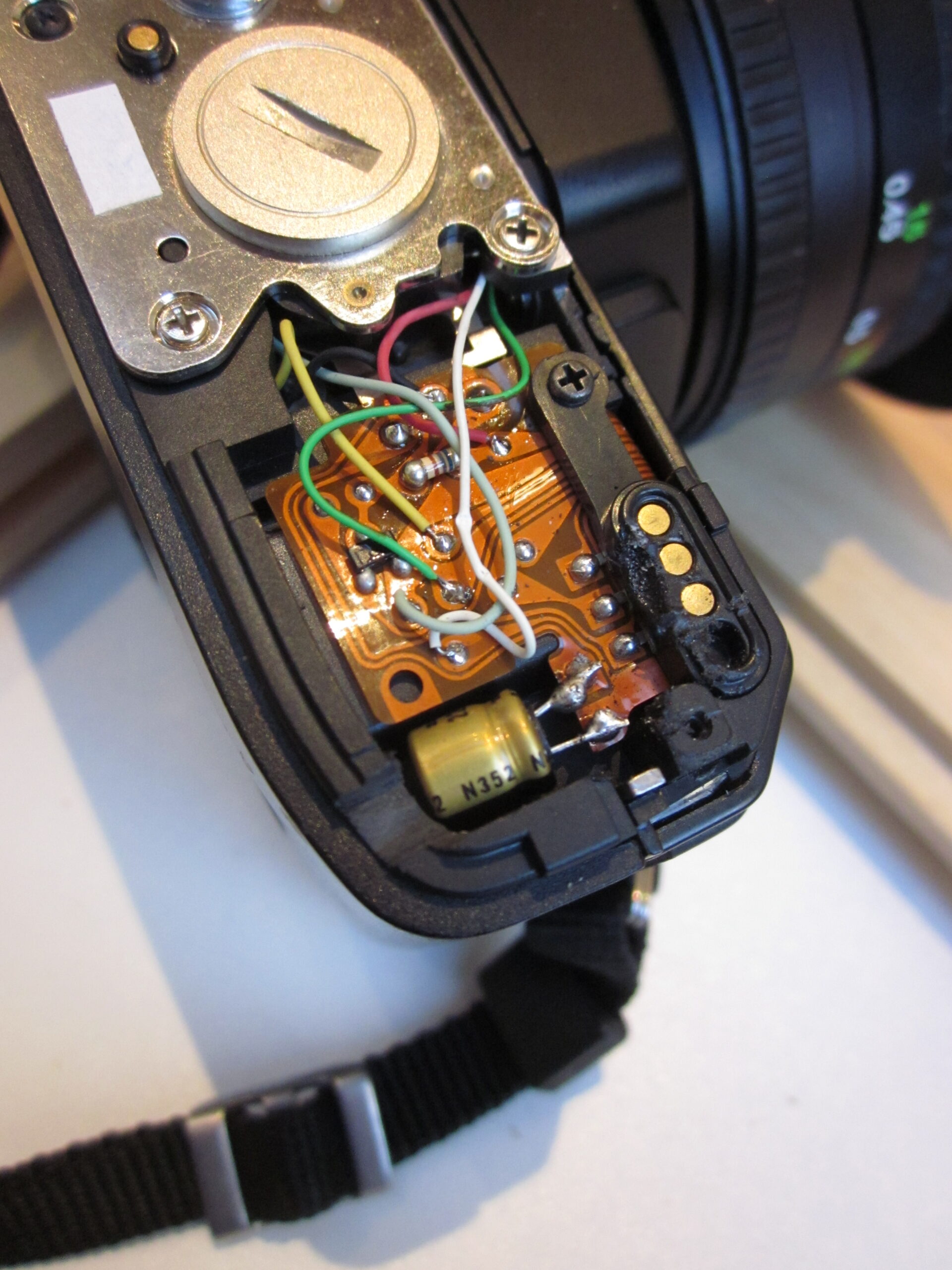 A photo showing the circuit board and new capacitor in the DF-300