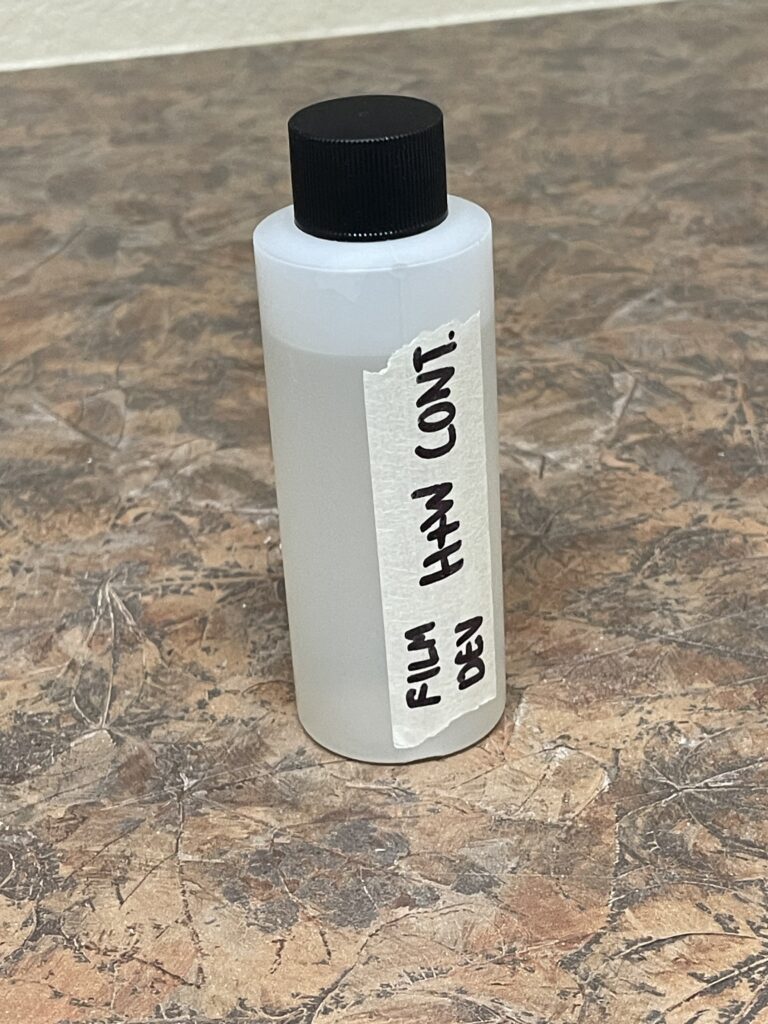 Bottle of H&W developer fully mixed