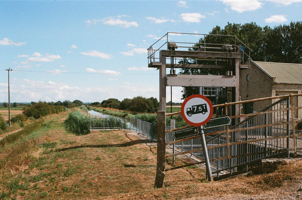 Sluce gate and bridge with subsiding signpost