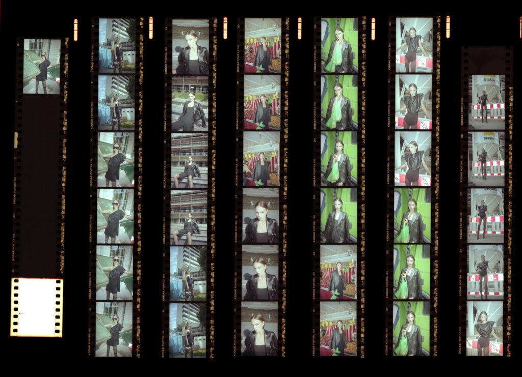 Contact sheet of a full roll of Kodak Portra 160, six strips of six frames, fashion shoot on location