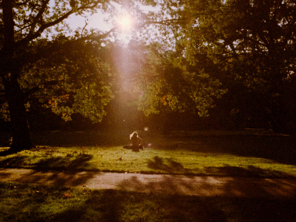 A person enjoying the sun inside a park