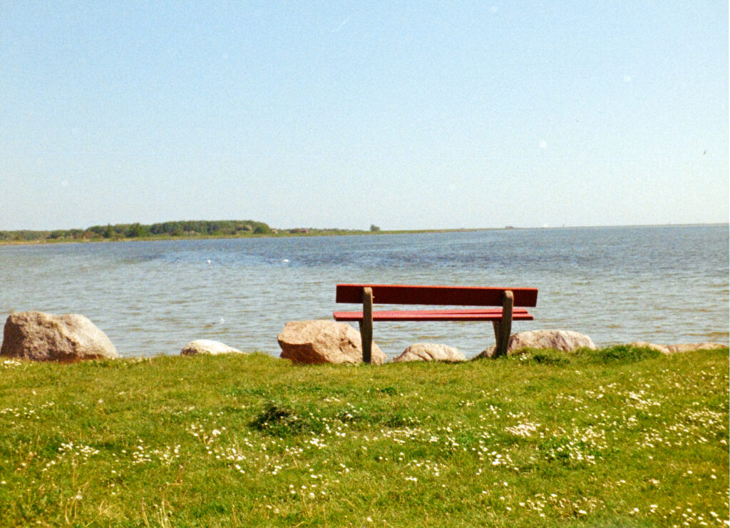 Park bench facing the sea