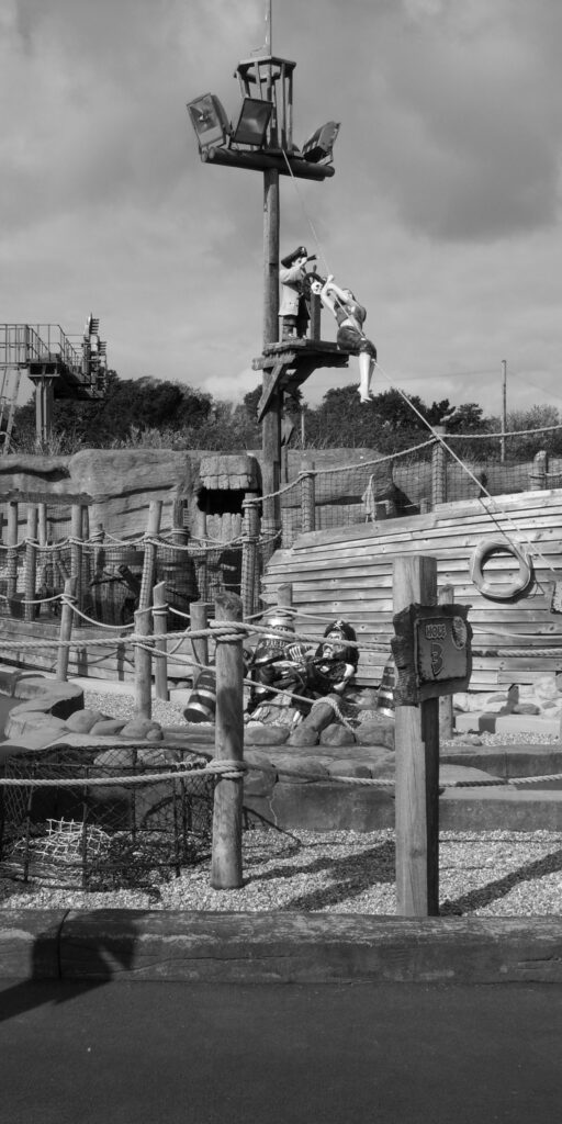 Monochrome image of the pirate ship at the funfair