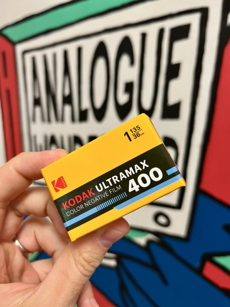 Eastman Kodak ULTRMAX 400 held up in front of Analogue Wonderland artwork