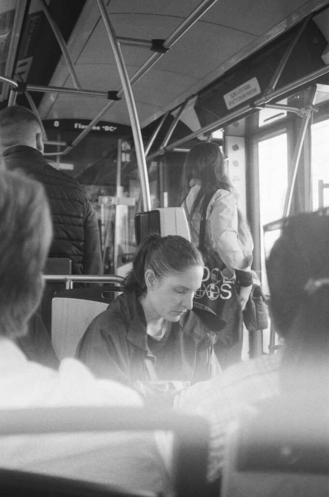 Woman seated in a tram