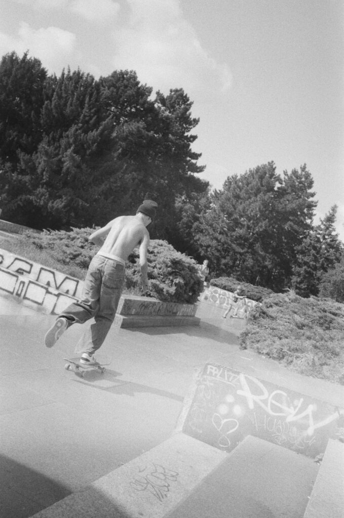 Boy skateboarding in park